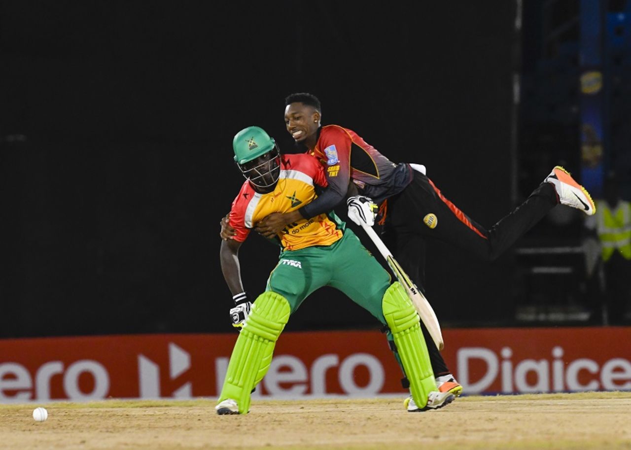 Khary Pierre and Chadwick Walton found themselves in a tangle, Trinbago Knight Riders v Guyana Amazon Warriors, CPL 2017, Port of Spain, August 11, 2017