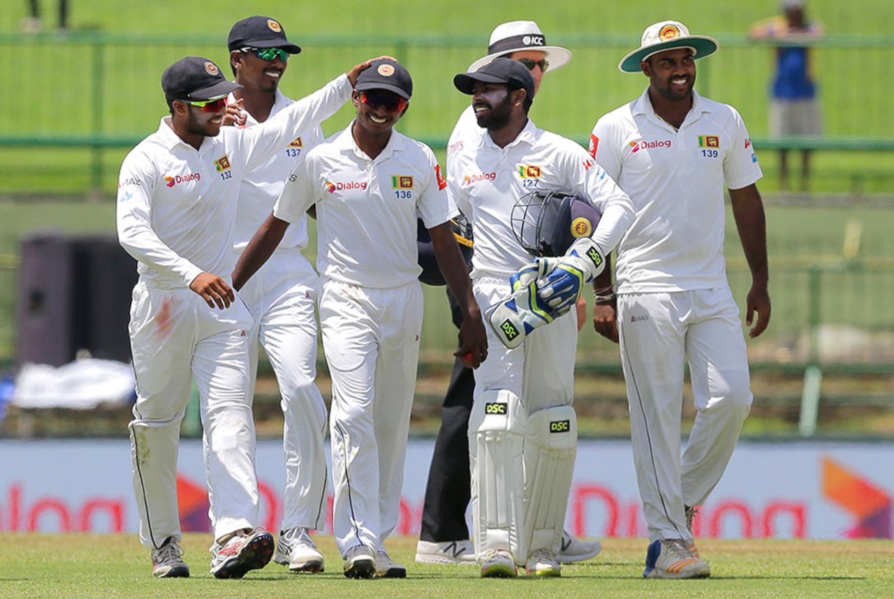 Lakshan Sandakan is congratulated by his team-mates on his maiden five-wicket haul, Sri Lanka v India, 3rd Test, 2nd day, Pallekele, August 13, 2017 