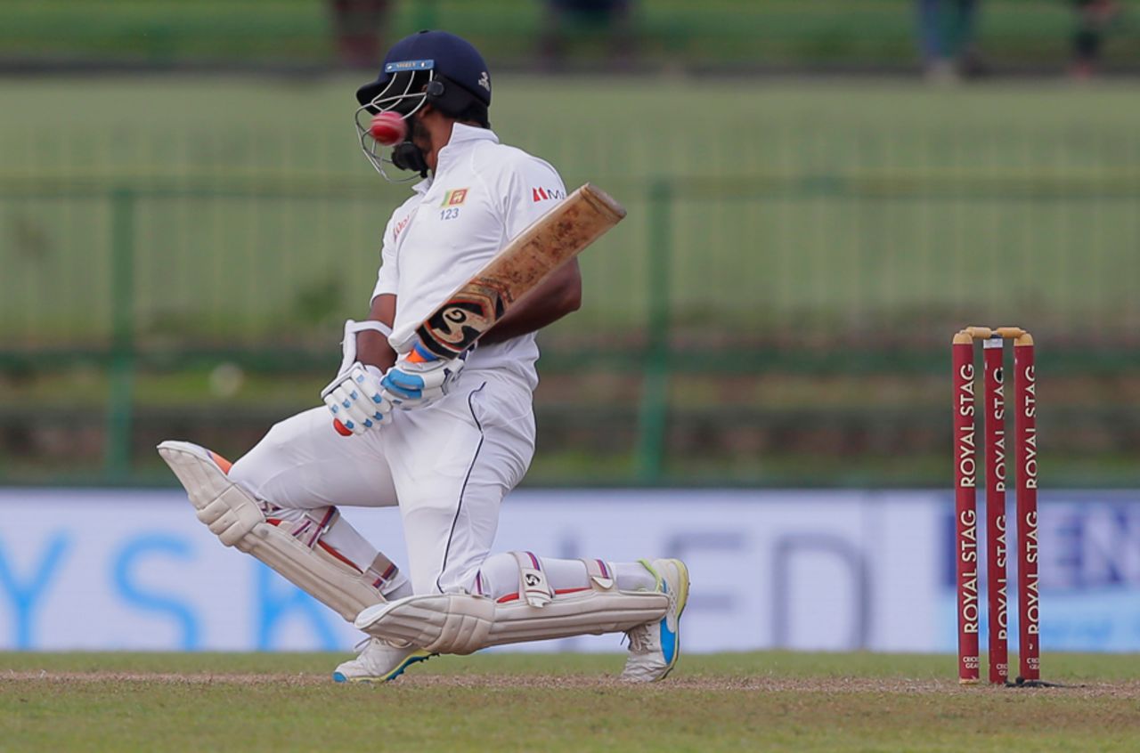 Dimuth Karunaratne tries to evade a bouncer, Sri Lanka v India, 3rd Test, 2nd day, Pallekele, August 13, 2017