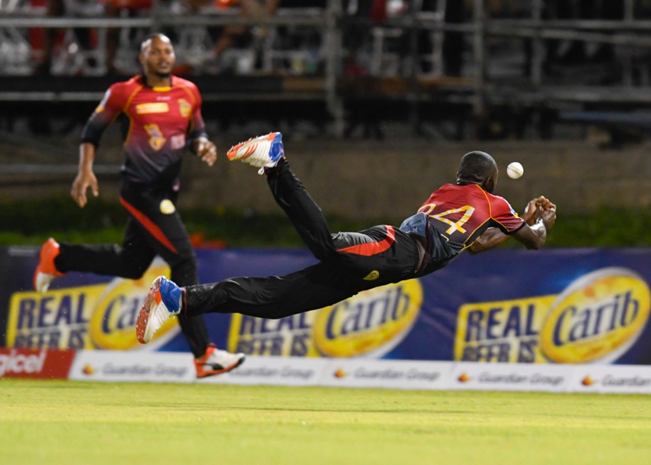 Anderson Phillip dives backward to attempt a catch, Trinbago Knight Riders v St Kitts and Nevis Patriots, CPL 2017, Port of Spain, August 14, 2017