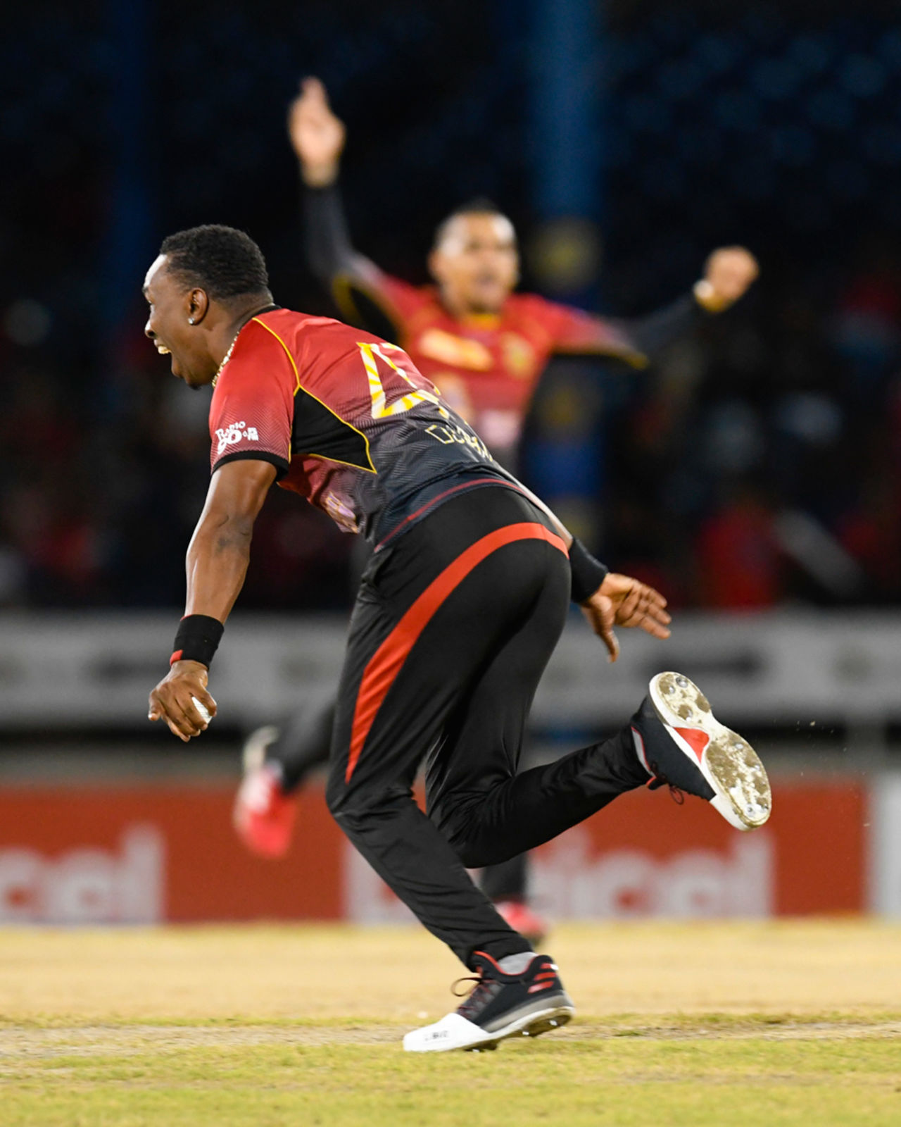 Dwayne Bravo wheels away in celebration after taking a catch, Trinbago Knight Riders v St Kitts and Nevis Patriots, CPL 2017, Port of Spain, August 14, 2017