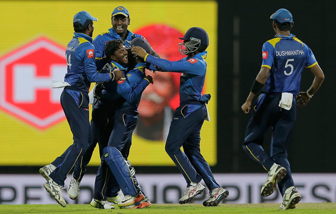 Akila Dananjaya celebrates with his team-mates after snaring his sixth victim, Sri Lanka v India, 2nd ODI, Pallekele, August 24, 2017