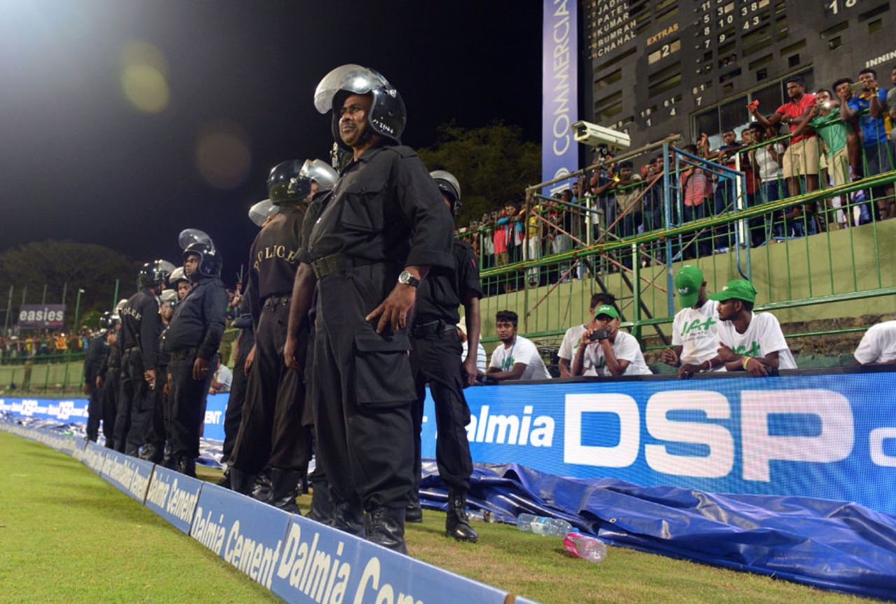 Sri Lanka police personnel stand guard after crowd trouble, Sri Lanka v India, 3rd ODI, Pallekele, August 27, 2017