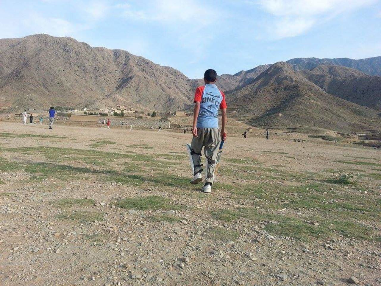 Youngsters play cricket in Marawara, Afghanistan