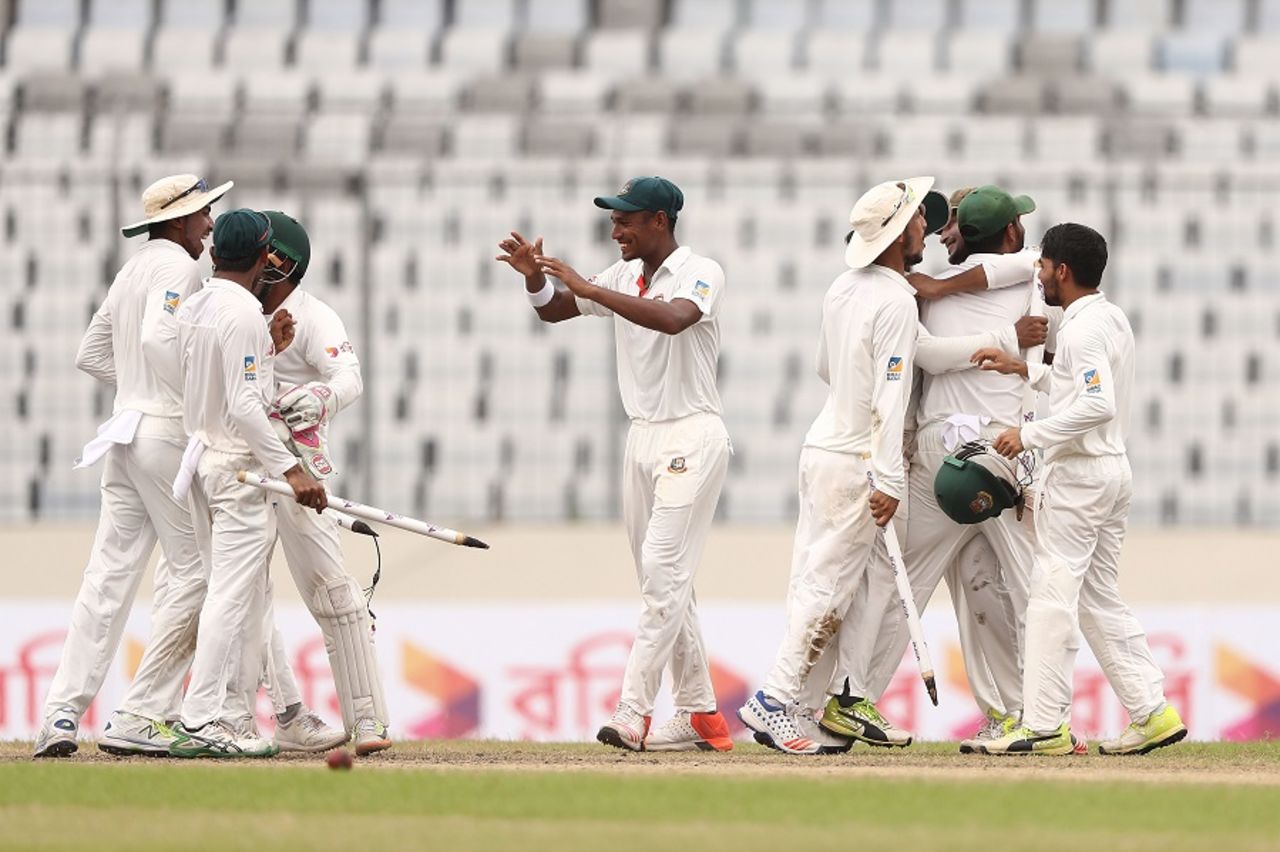 Bangladesh's players celebrate after wrapping up a famous win, Bangladesh v Australia, 1st Test, Mirpur, 4th day, August 30, 2017