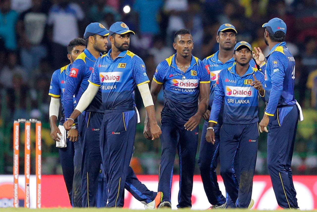 The Sri Lankan players gather around Vishwa Fernando after the dismissal of Rohit Sharma, Sri Lanka v India, 5th ODI, Colombo, September 3, 2017