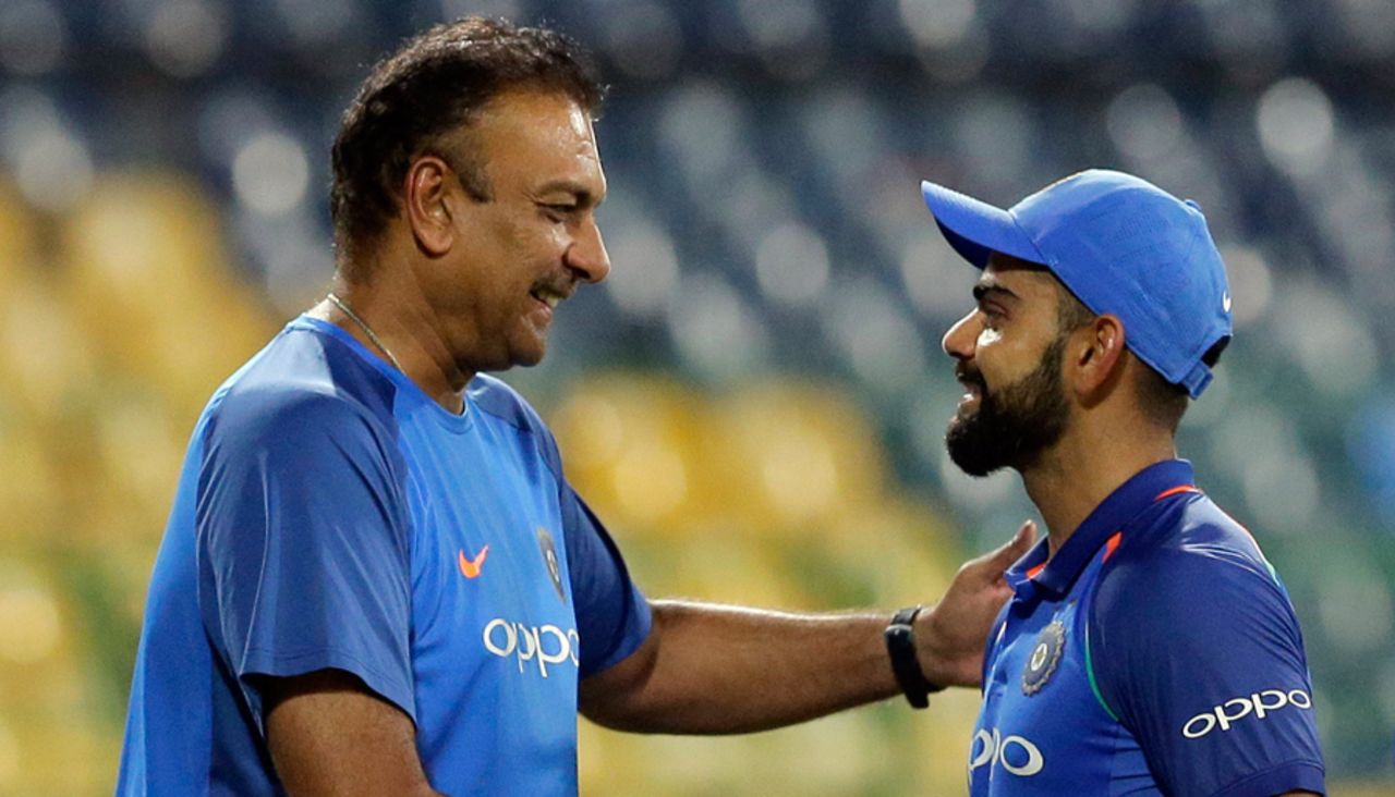 India head coach Ravi Shastri congratulates Virat Kohli on the six-wicket victory, Sri Lanka v India, 5th ODI, Colombo, September 3, 2017