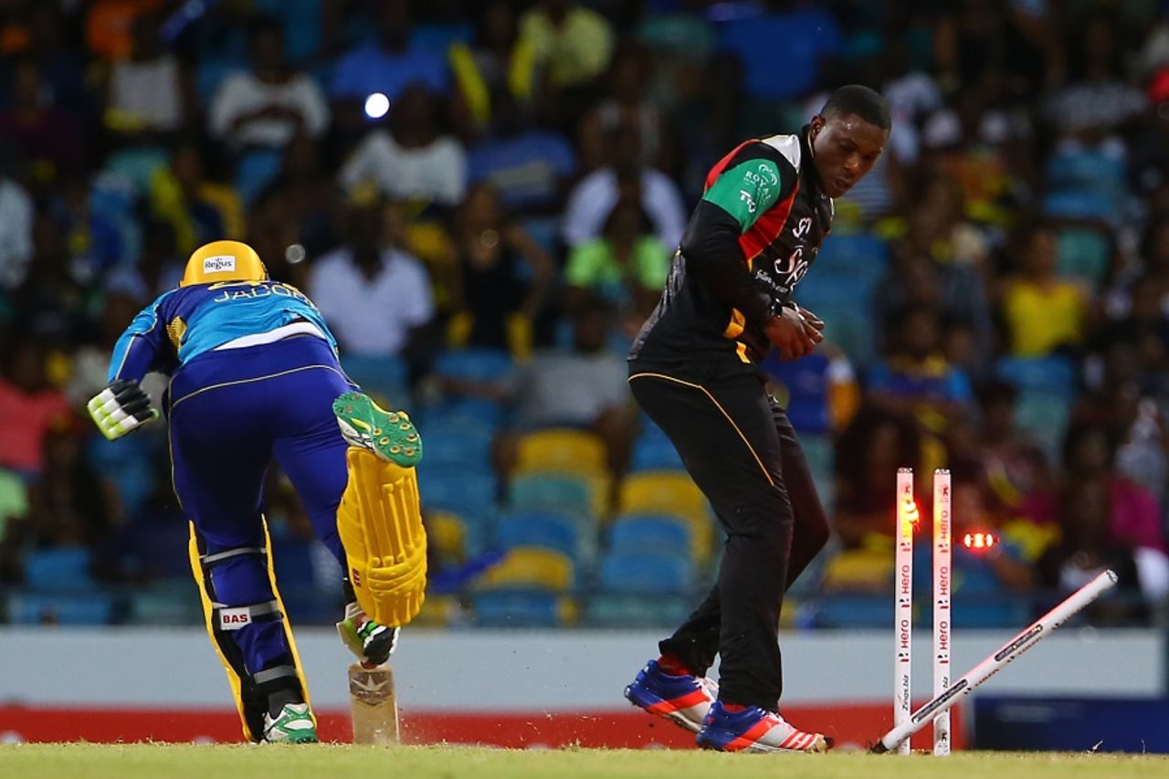 Sheldon Cottrell breaks the stumps to run out Damien Jacobs, Barbados Tridents v St Kitts and Nevis Patriots, CPL 2017, Bridgetown, September 3, 2017