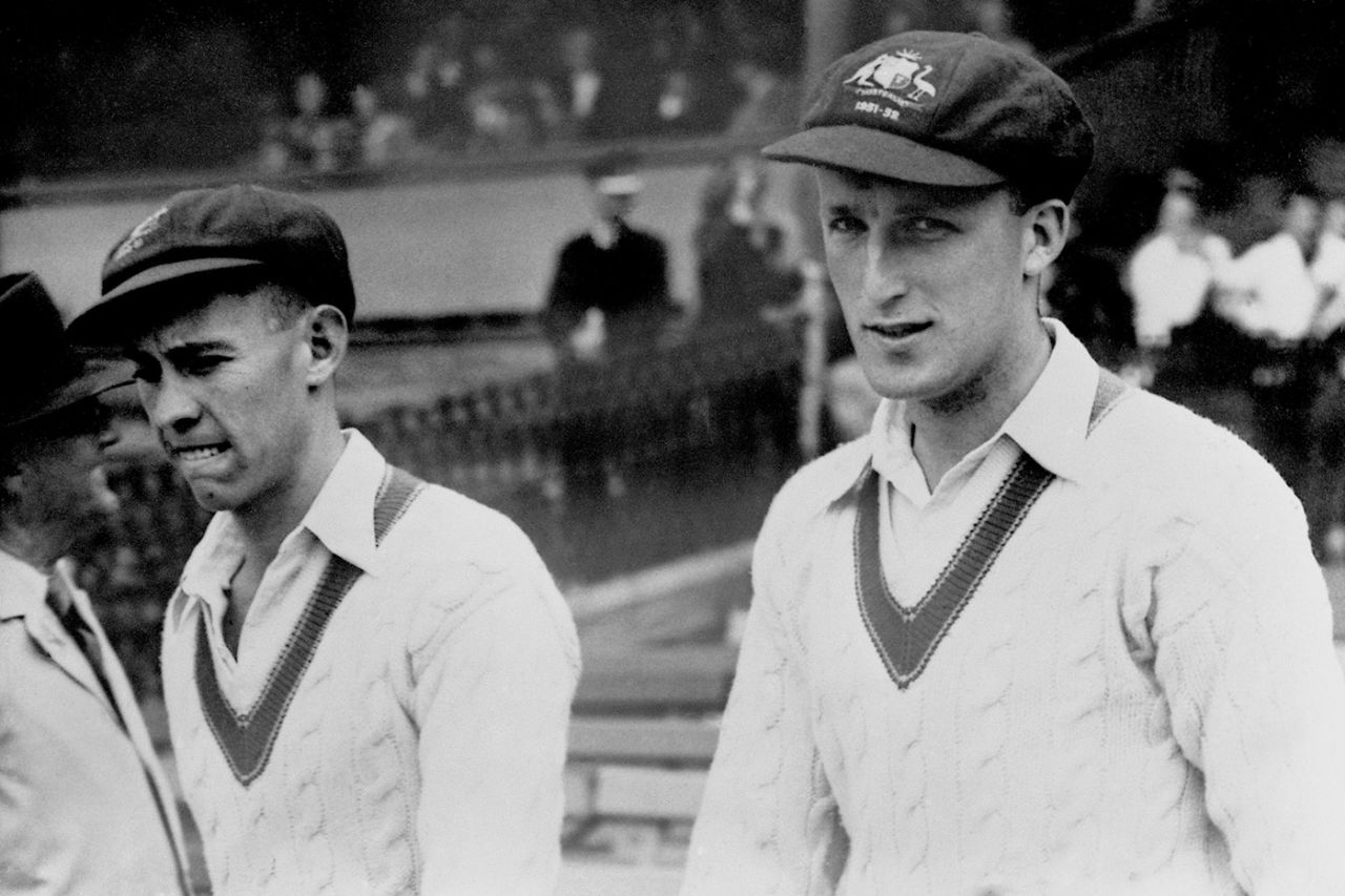 Ken Archer (left) and Graeme Hole walk out onto the field, Australia v West Indies, second Test, day one, Sydney, November 30, 1951 