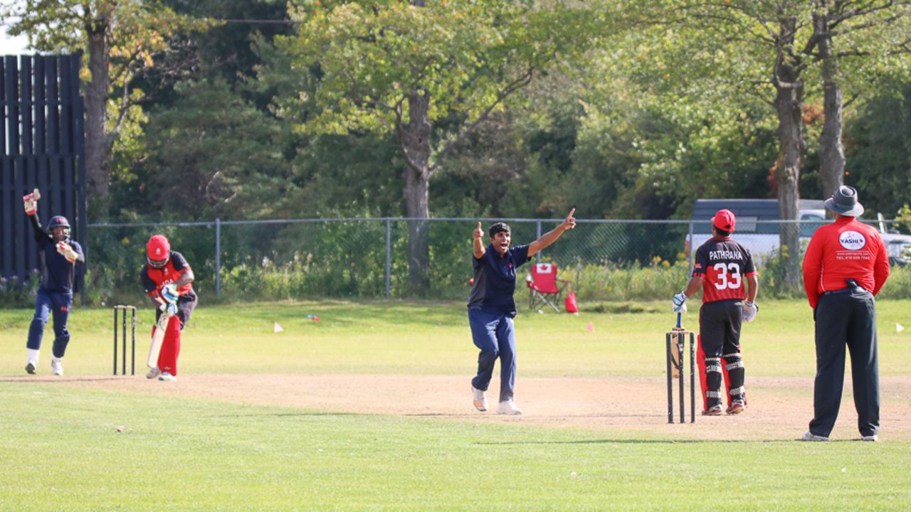 Nosthush Kenjige belts out a successful lbw appeal for the wicket of Srimantha Wijeratne, the first in his hat-trick sequence, Canada v USA, Auty Cup, King City, September 13, 2017