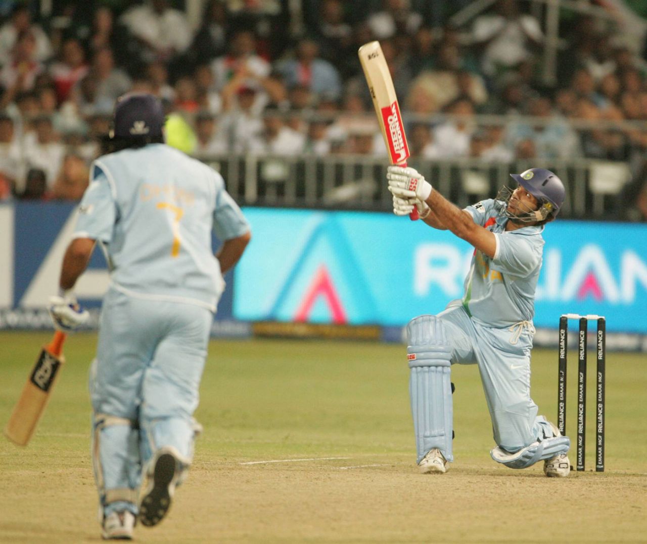 MS Dhoni looks on as Yuvraj Singh sends one soaring into the stands, England v India, Group E, ICC World Twenty20, Durban, September 19, 2007