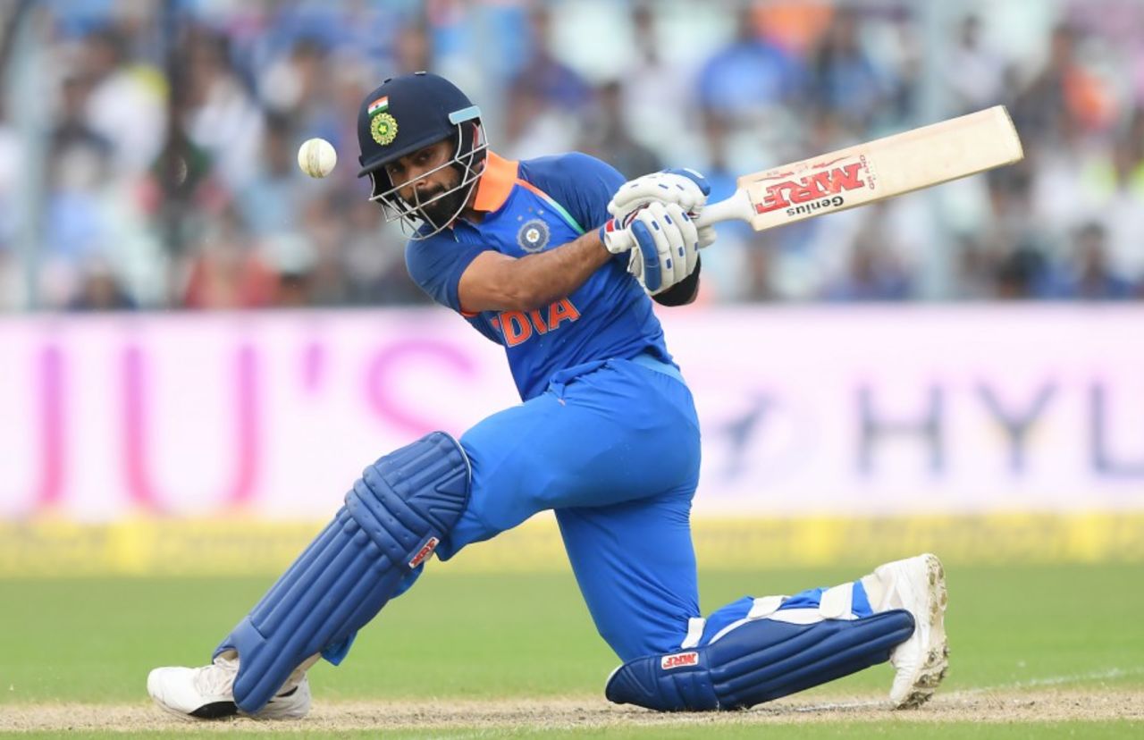 Virat Kohli attempts a rare sweep shot, India v Australia, 2nd ODI, Kolkata, September 21, 2017