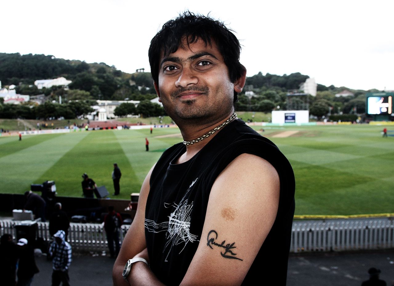 A fan shows off his tattoo of Sachin Tendulkar's autograph on his arm, Wellington, April 5, 2009