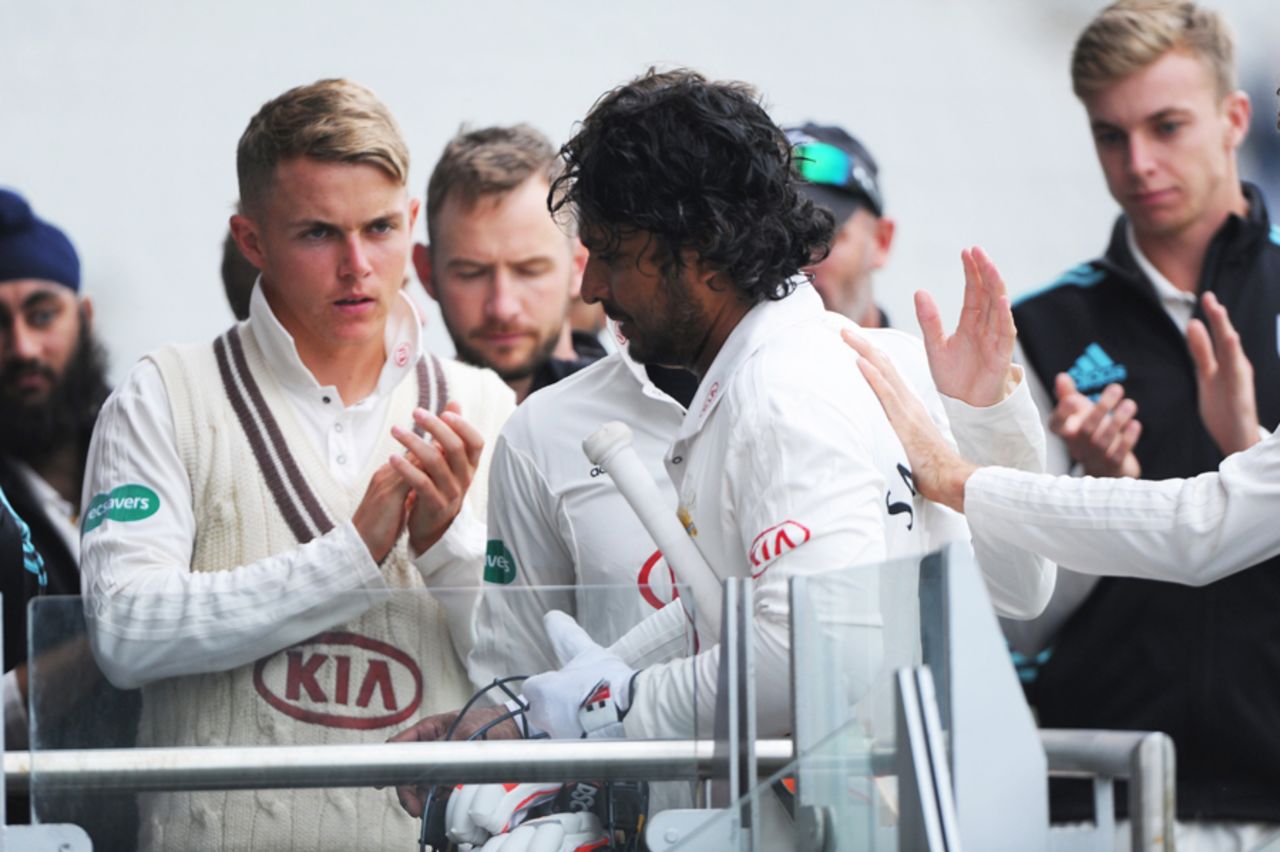 Sadness for Kumar Sangakkara as he returns to the Surrey dressing room after his final first-class innings, Lancashire v Surrey, Specsavers Championship, Division One, Old Trafford, 3rd day, September 27, 2017