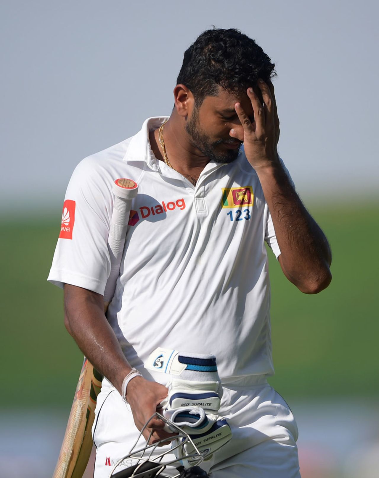 A dejected Dimuth Karunaratne walks off the field, Pakistan v Sri Lanka, 1st Test, 1st day, Abu Dhabi, 28 September, 2017