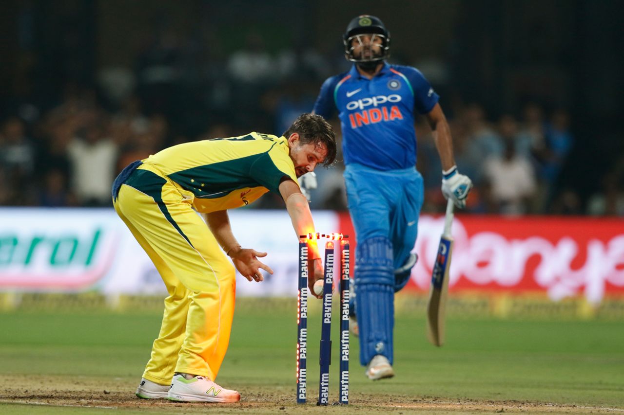 Rohit Sharma is a long way short of the crease as Kane Richardson knocks off the bails, India v Australia, 4th ODI, Bengaluru, September 28, 2017