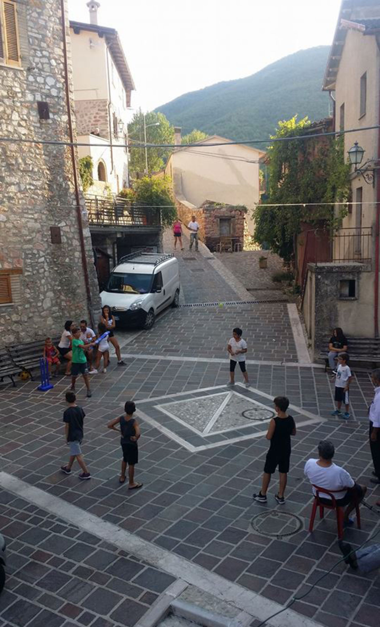 <b>Franco Esposito</b>: Kids play cricket in the main piazza of Roccatamburo, a remote mountain hamlet in central Italy