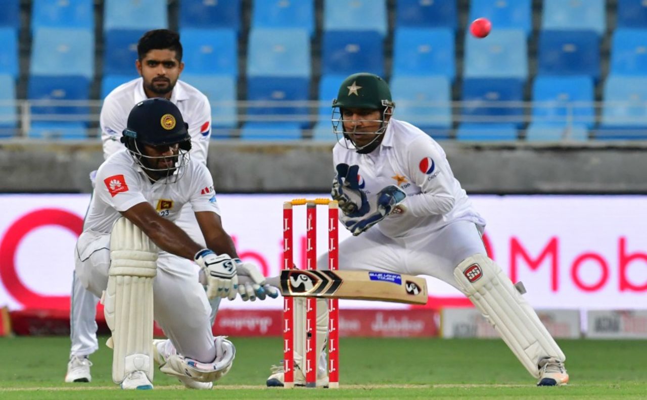 Dimuth Karunaratne lays into a reverse-sweep, Pakistan v Sri Lanka, 2nd Test, Dubai, 1st day, October 6, 2017