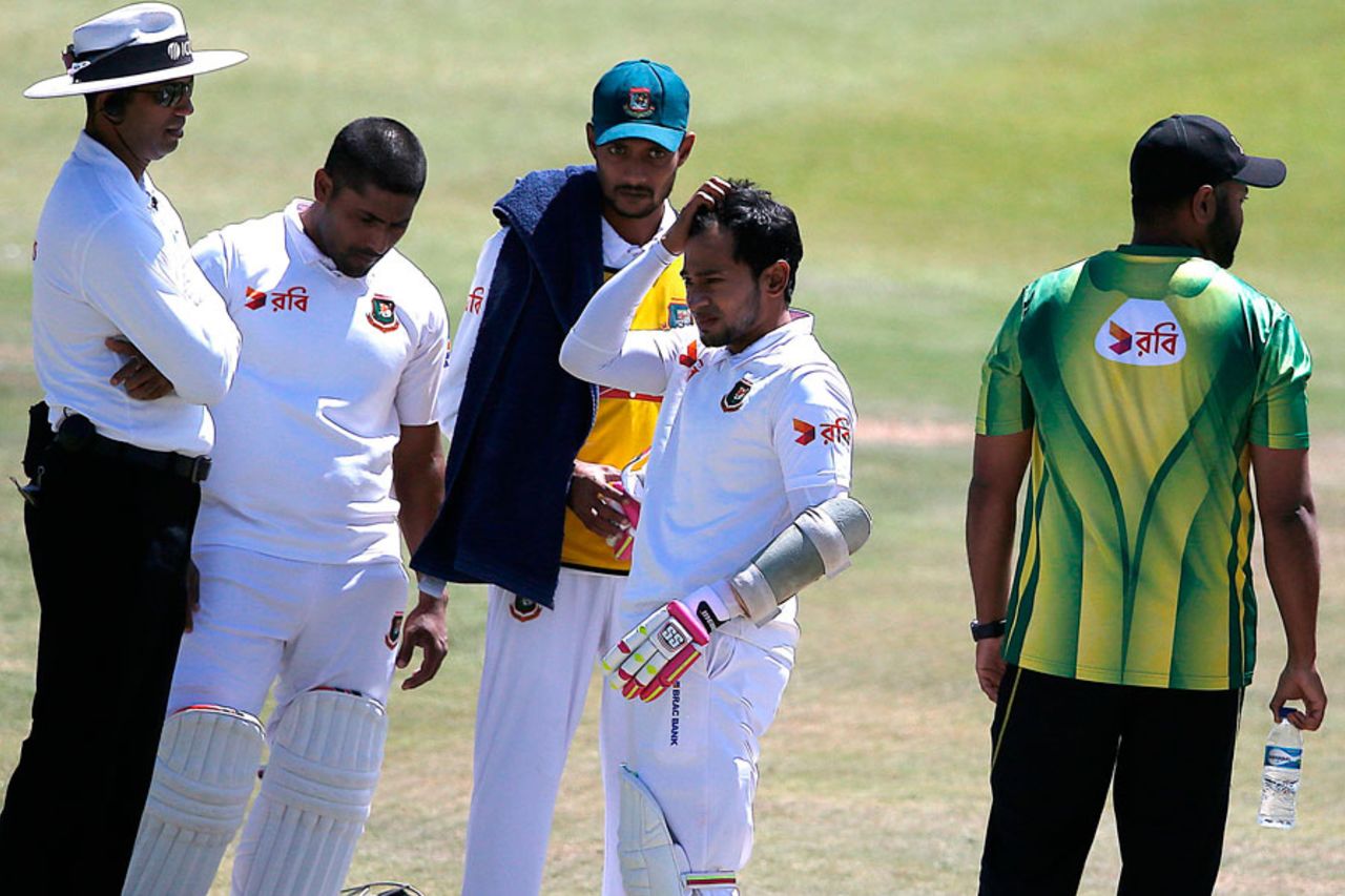 Mushfiqur Rahim gets back on his feet after being hit on the helmet, South Africa v Bangladesh, 1st Test, Bloemfontein, 3rd day, October 8, 2017