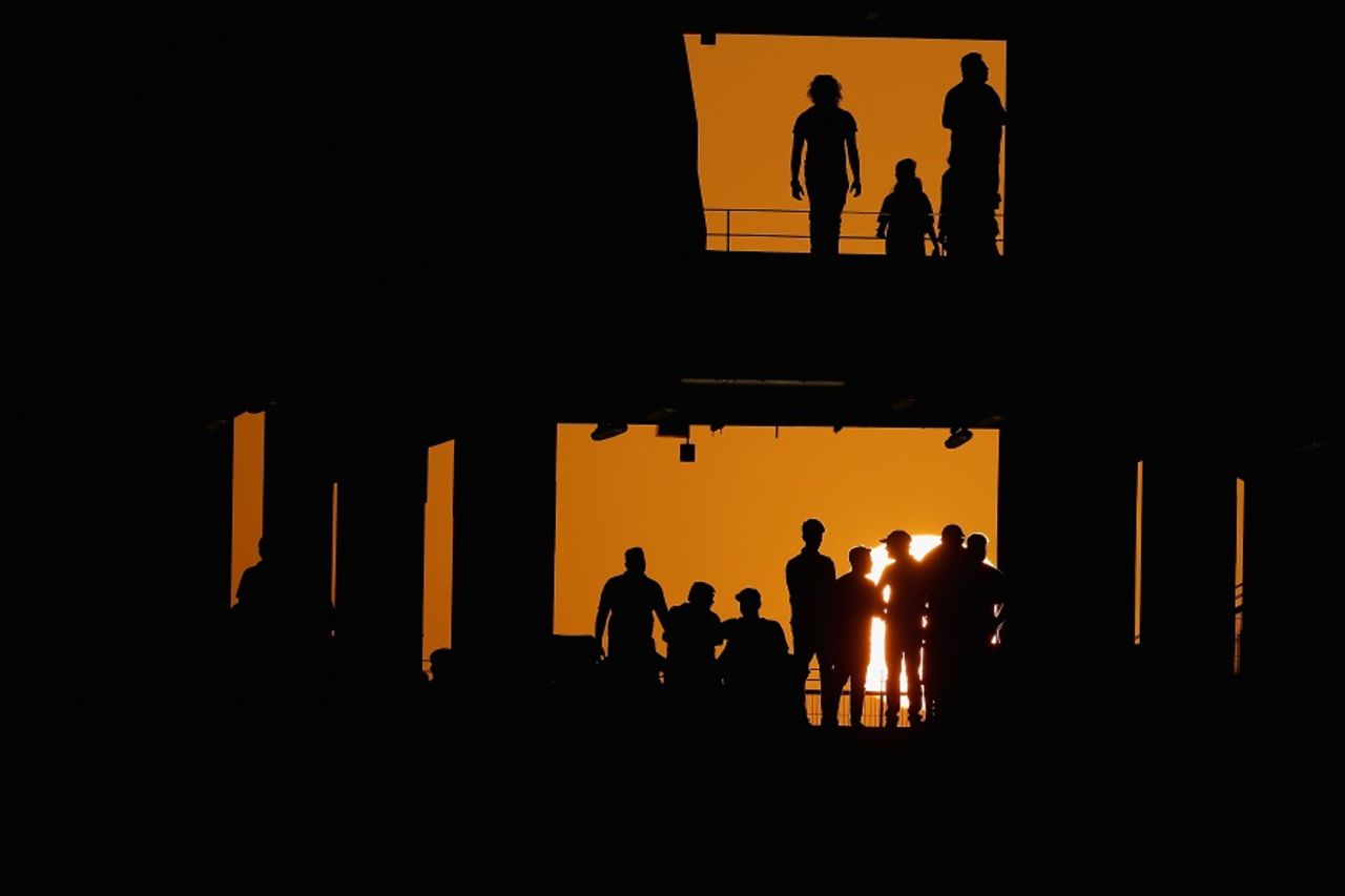 Fans are silhouetted against Dubai's setting sun, Pakistan v Sri Lanka, 1st ODI, Dubai, October 13, 2017