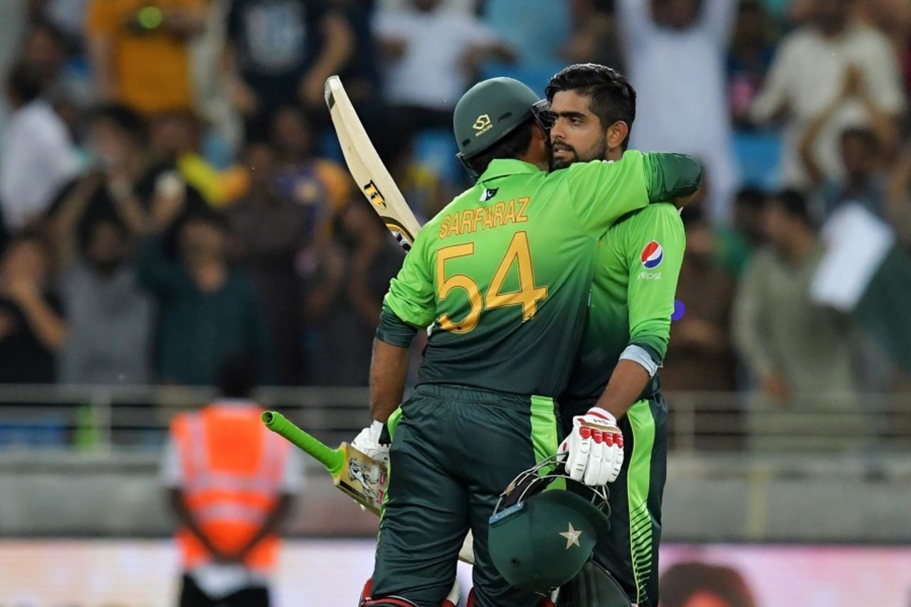 Babar Azam is pulled into an embrace by his captain after raising his sixth ODI century, Pakistan v Sri Lanka, 1st ODI, Dubai, October 13, 2017
