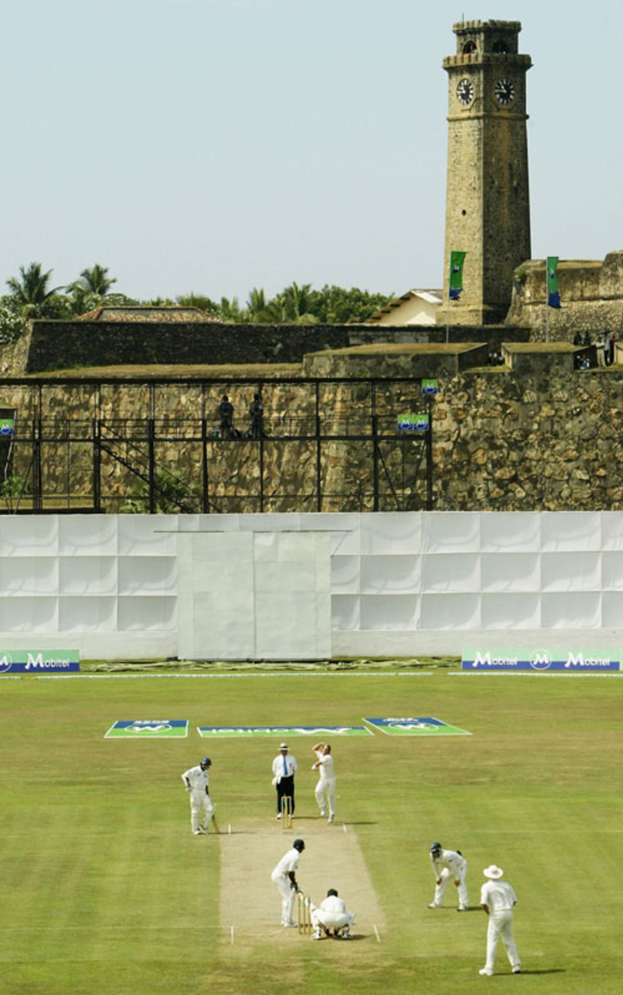 Shane Warne bowls with the famous fort in the background, Sri Lanka v Australia,  Galle, March 9, 2004