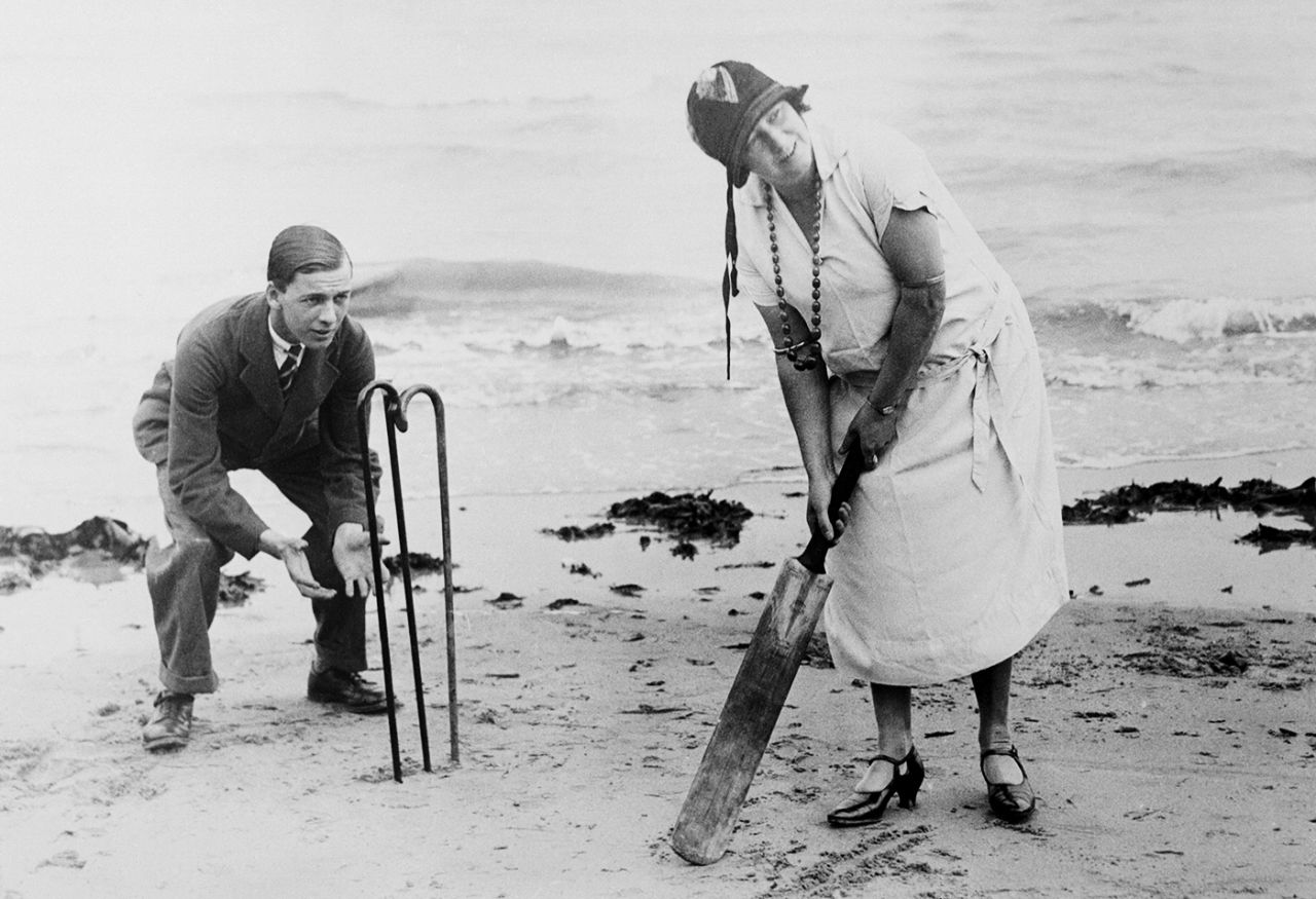 Jack Hobbs' wife, Ada, bats on the beach with her son John keeping wicket, Cliftonvillle, August 1925