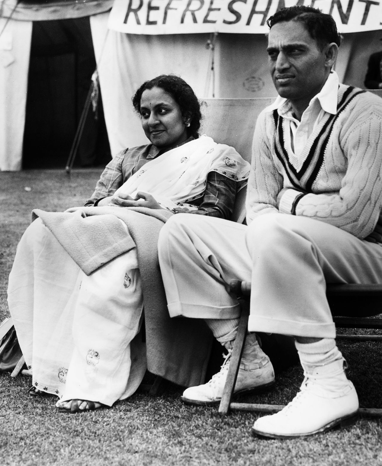 Hemu Adhikari with his wife Kamal at the sidelines of a tour game in England, 1952
