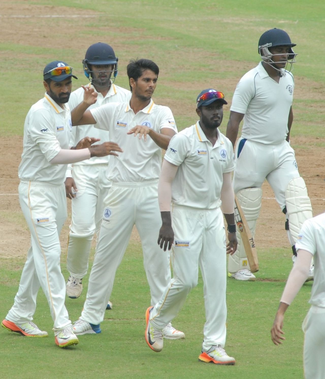 K Vignesh is mobbed by his team-mates, Tamil Nadu v Tripura, Ranji Trophy 2017-18, second round, 2nd day, Chennai, October 15, 2017