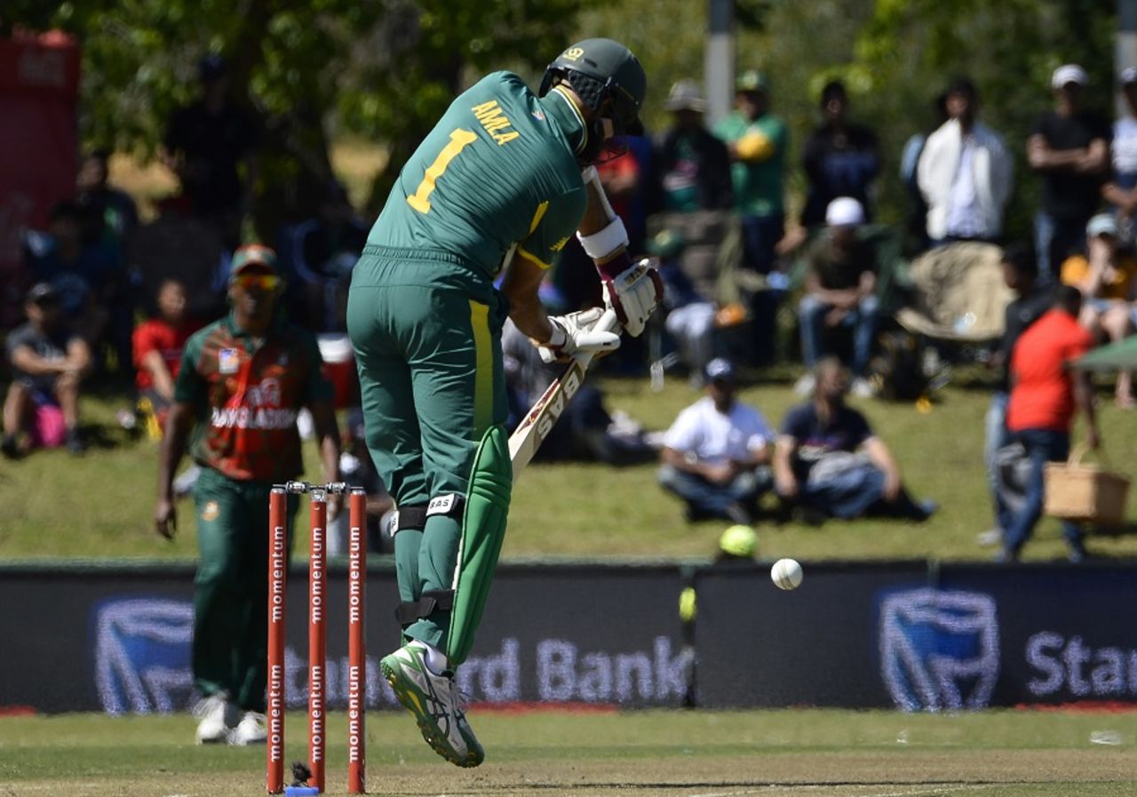 Hashim Amla jumps and pats one down, South Africa v Bangladesh, 2nd ODI, Paarl, October 18, 2017