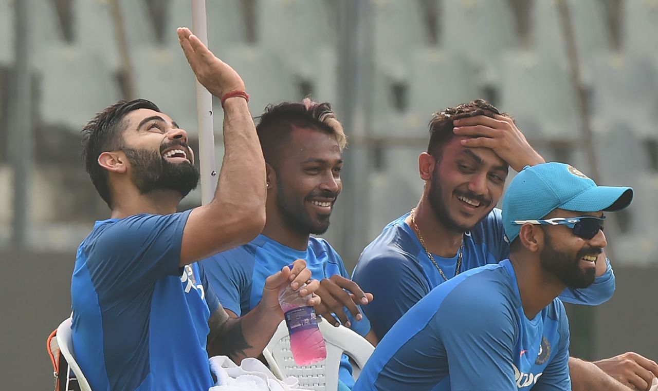 Virat Kohli enjoys a light moment with team-mates, Mumbai, October 21, 2017