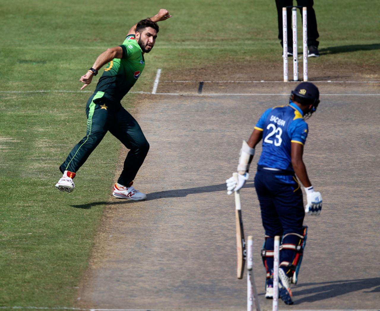 Usman Khan exults after pegging back Sadeera Samarawickrama's middle stump, Pakistan v Sri Lanka, 5th ODI, Sharjah, October 23, 2017