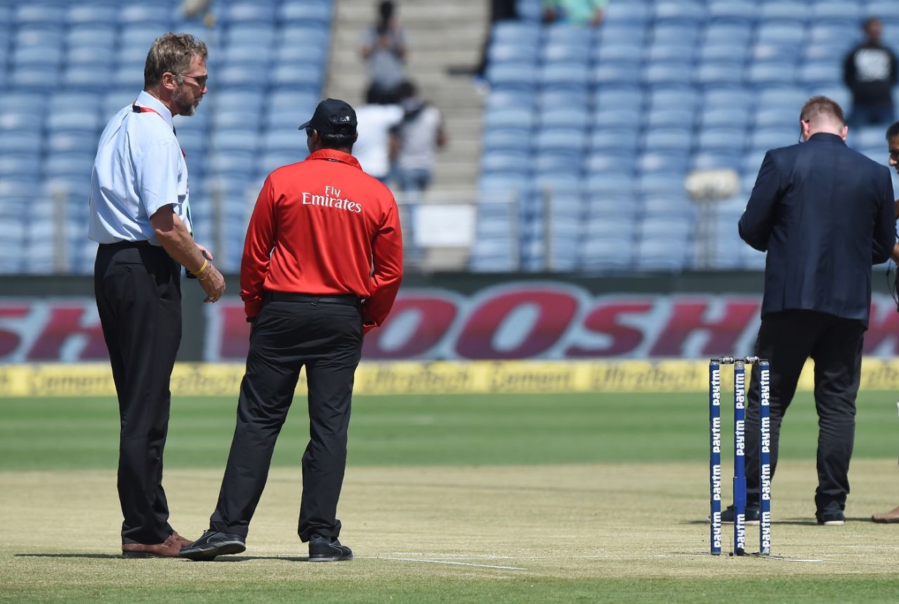 Match Referee Chris Broad inspects the pitch ahead of the 2nd ODI, India v New Zealand, 2nd ODI, Pune, October 25, 2017