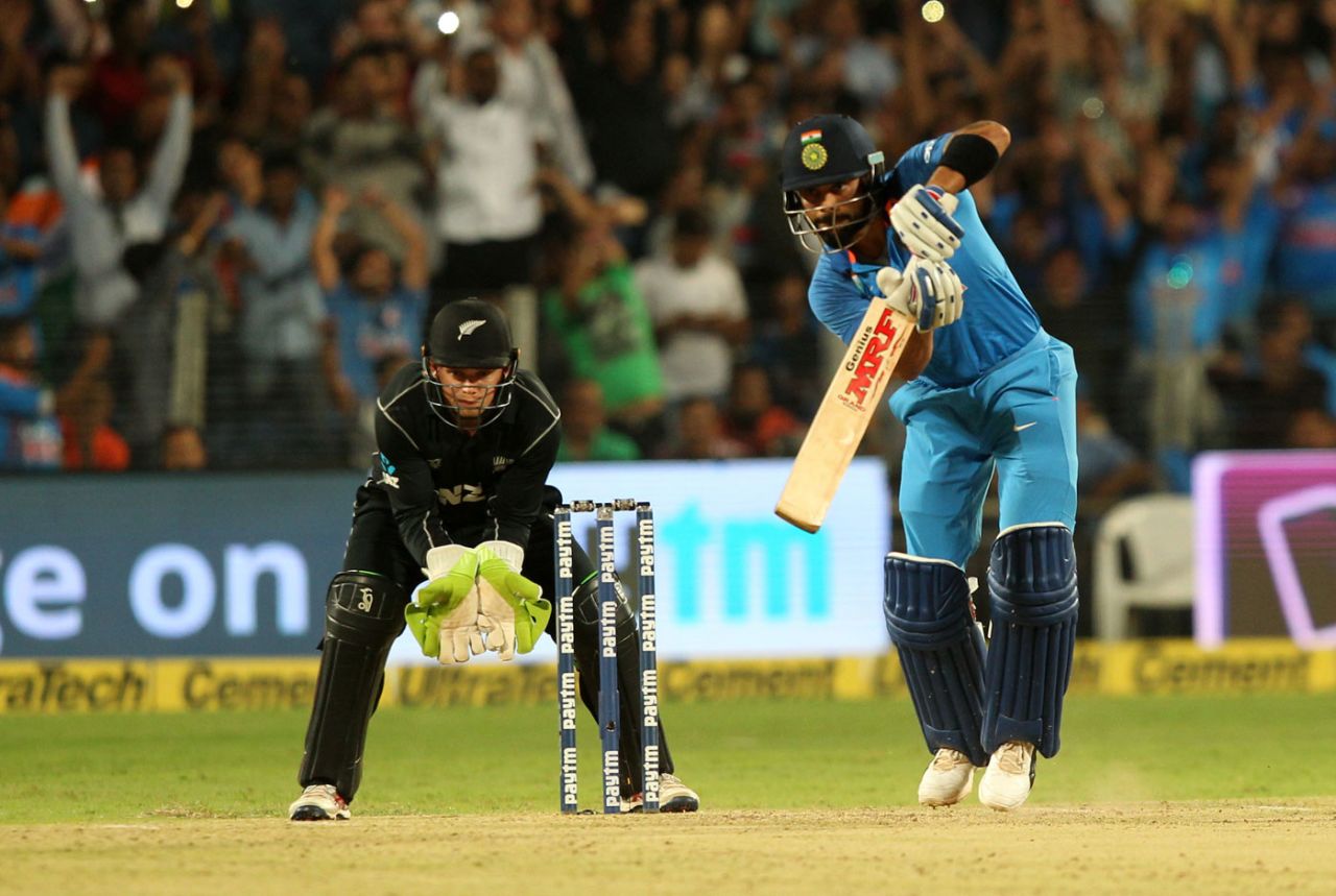 Virat Kohli punches through the covers, India v New Zealand, 2nd ODI, Pune, 25 October, 2017