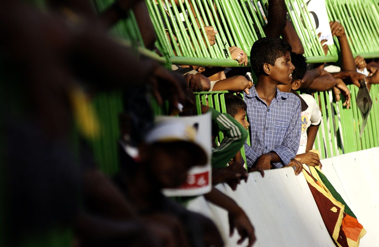 A fan holds the Sri Lanka flag, Sri Lanka v Pakistan, ICC Champions Trophy, Colombo, September 12, 2002
