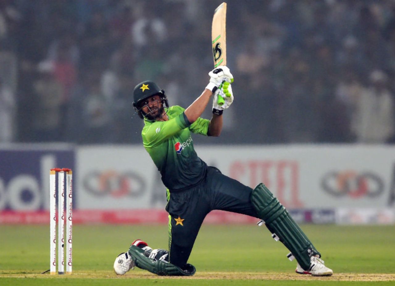 Shoaib Malik is down on one knee as he carves a full-length delivery over cover, Pakistan v Sri Lanka, 3rd T20I, Lahore, October 29, 2017