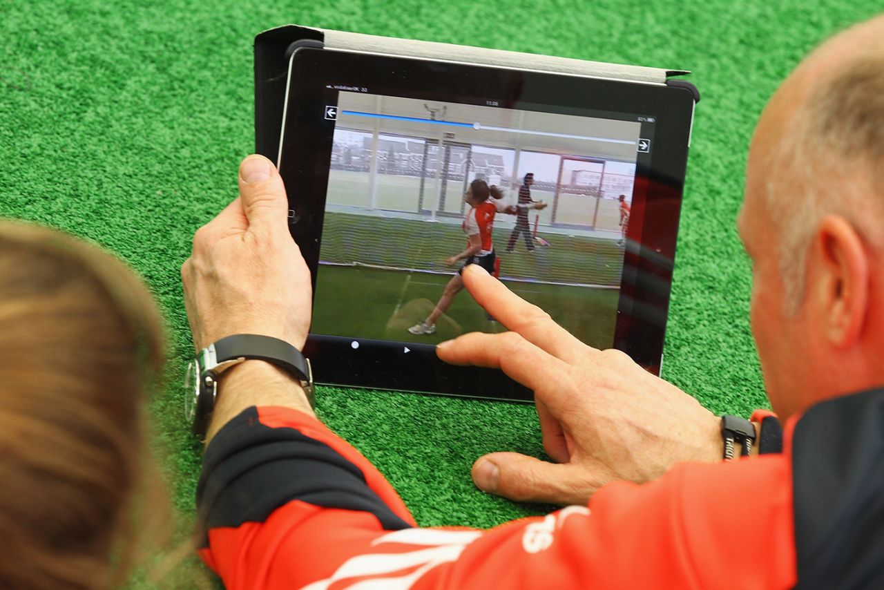Analyst Paul Jarvis and Natalie Sciver look at a tablet with a video of Sciver's bowling on it, National Cricket Performance Centre, Loughborough, February 18, 2012