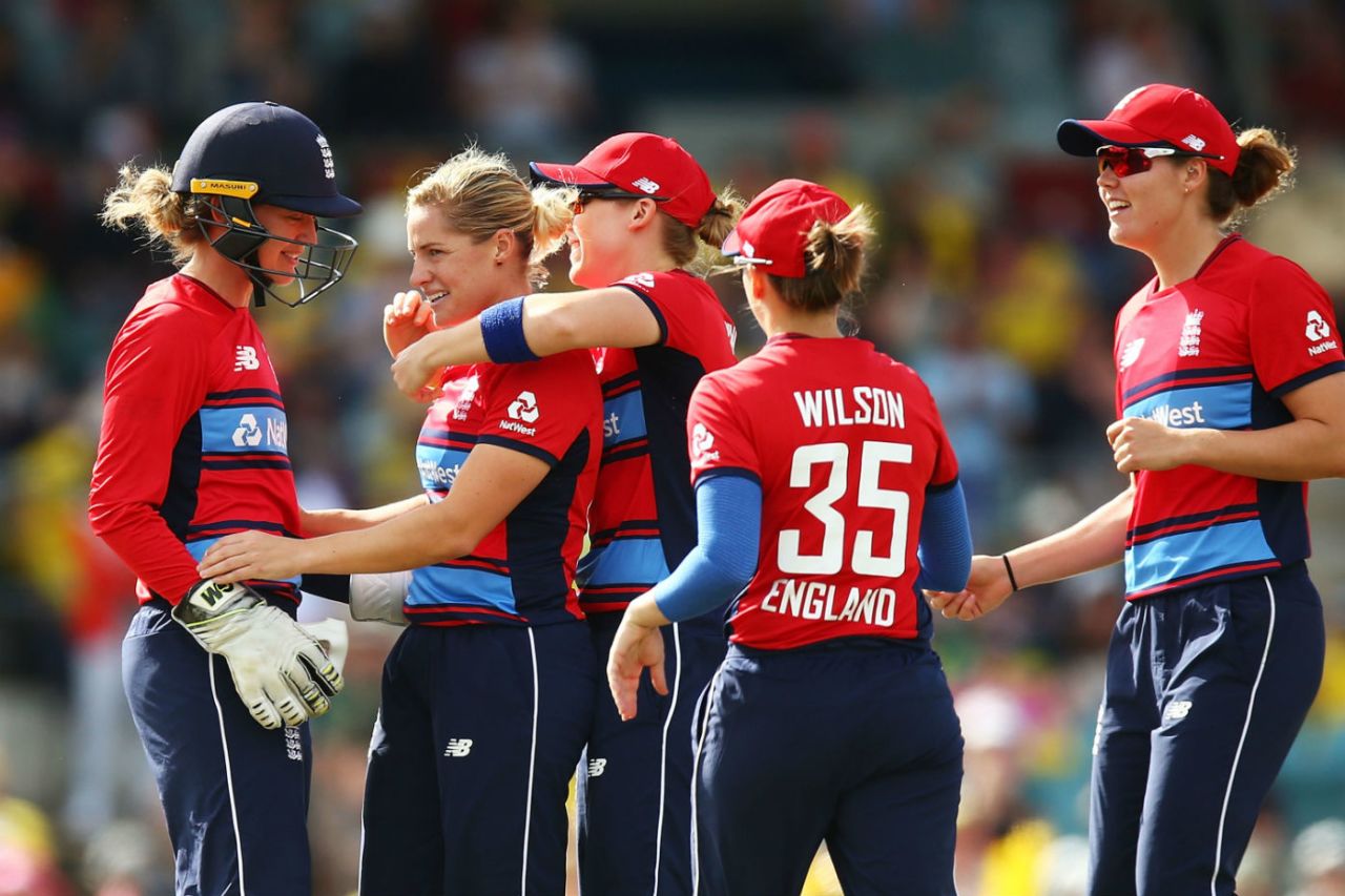 Katherine Brunt is mobbed by her team-mates, Australia v England, 2nd T20I, Canberra, Women's Ashes, November 19, 2017