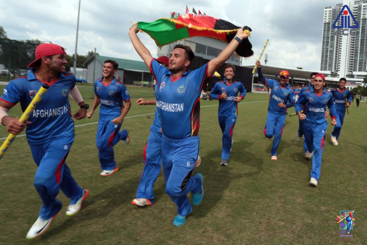 The Afghanistan Under-19s celebrate their win with a victory lap, Afghanistan v Pakistan, U-19s Asia Cup, final, Kuala Lumpur, November 19, 2017