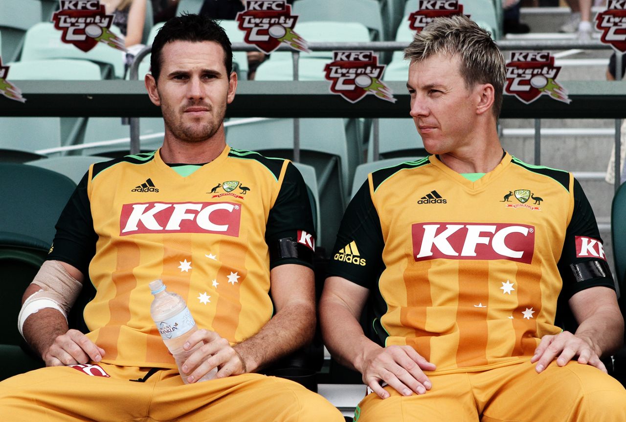 Shaun Tait and Brett Lee sit in the dugout, Australia v England, 1st Twenty20, Adelaide, January 12, 2011