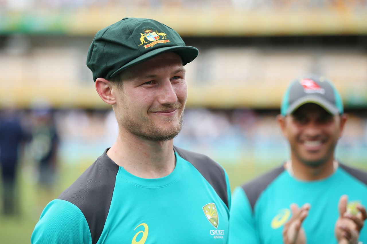 Cameron Bancroft sports a smile after being handed the baggy green by Geoff Marsh on his Test debut, Australia v England, 1st Test, The Ashes 2017-18, 1st day, Brisbane, November 23, 2017