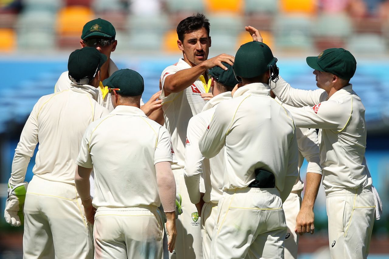 Mitchell Starc is congratulated after one of his three wickets, Australia v England, 1st Test, Brisbane, 4th day, November 26, 2017