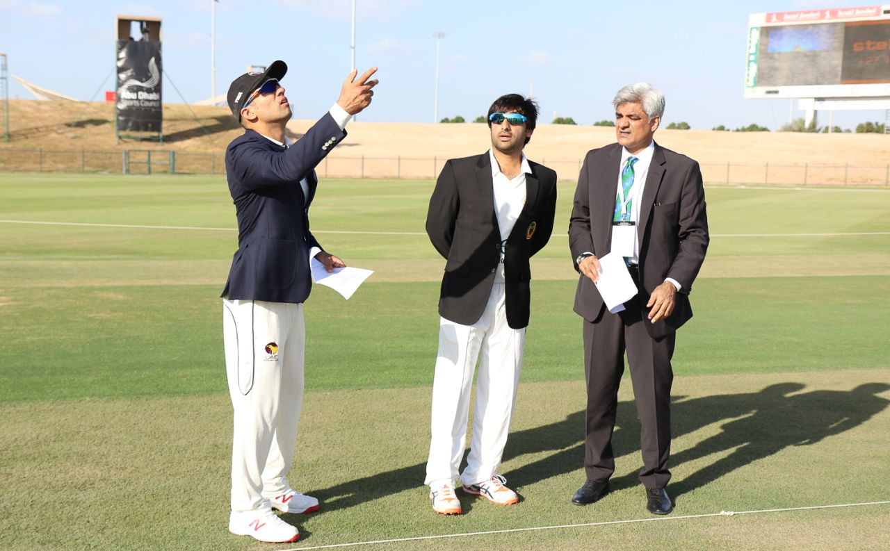 Afghanistan captain Asghar Stanikzai makes the call at the toss ahead of Afghanistan's final match in the Intercontinental Cup, UAE v Afghanistan, 2015-17 Intercontinental Cup, 1st day, Abu Dhabi, November 29, 2017