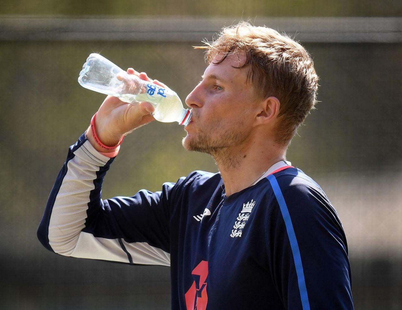 Thirsty work: Joe Root refreshes during nets, Adelaide, November 30, 2017