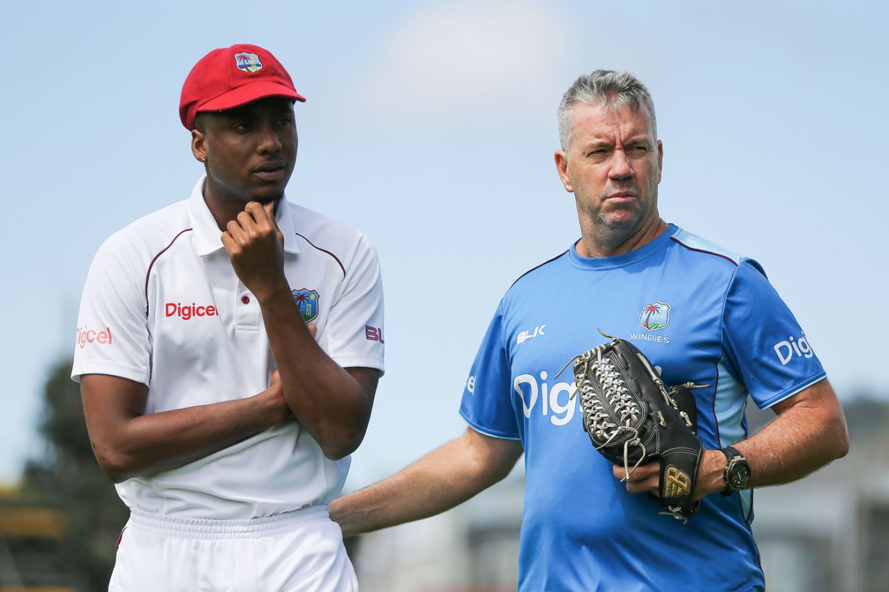 Miguel Cummins and West Indies coach Stuart Law look on after having a chat in between overs, New Zealand v West Indies, 1st Test, Wellington, 2nd day, December 2, 2017