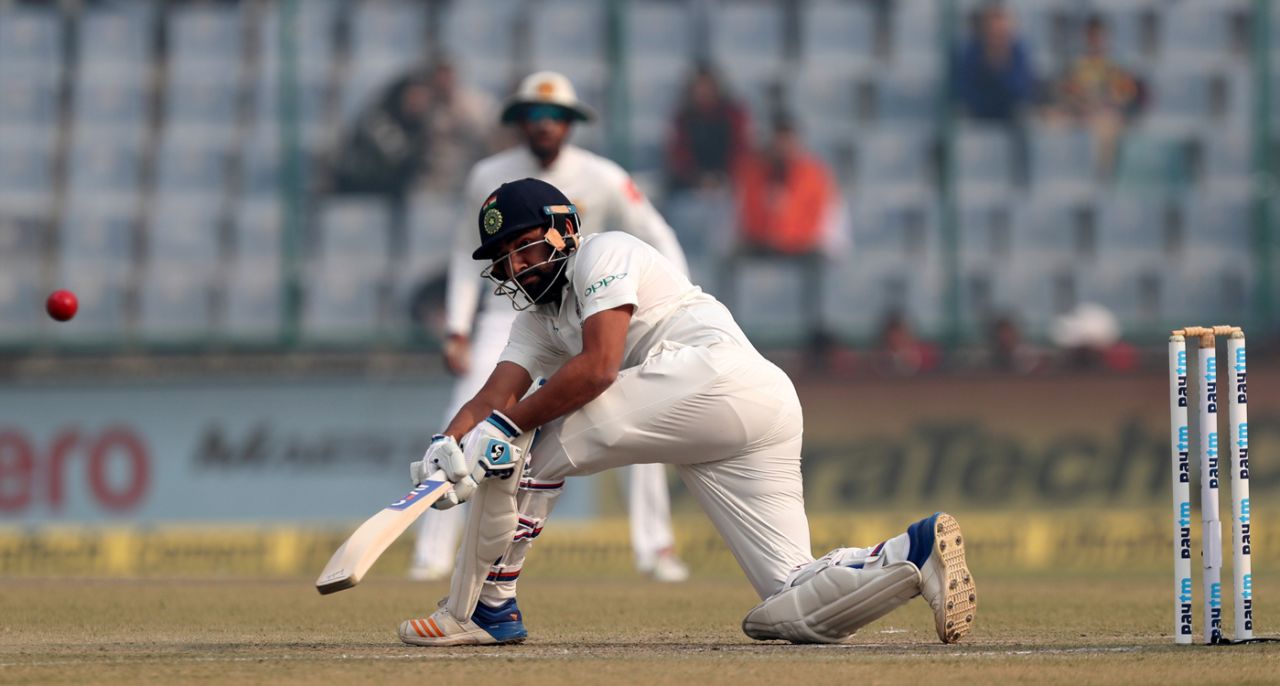 Rohit Sharma lunges low to sweep one square , India v Sri Lanka, 3rd Test, Delhi, 2nd day, December 3, 2017