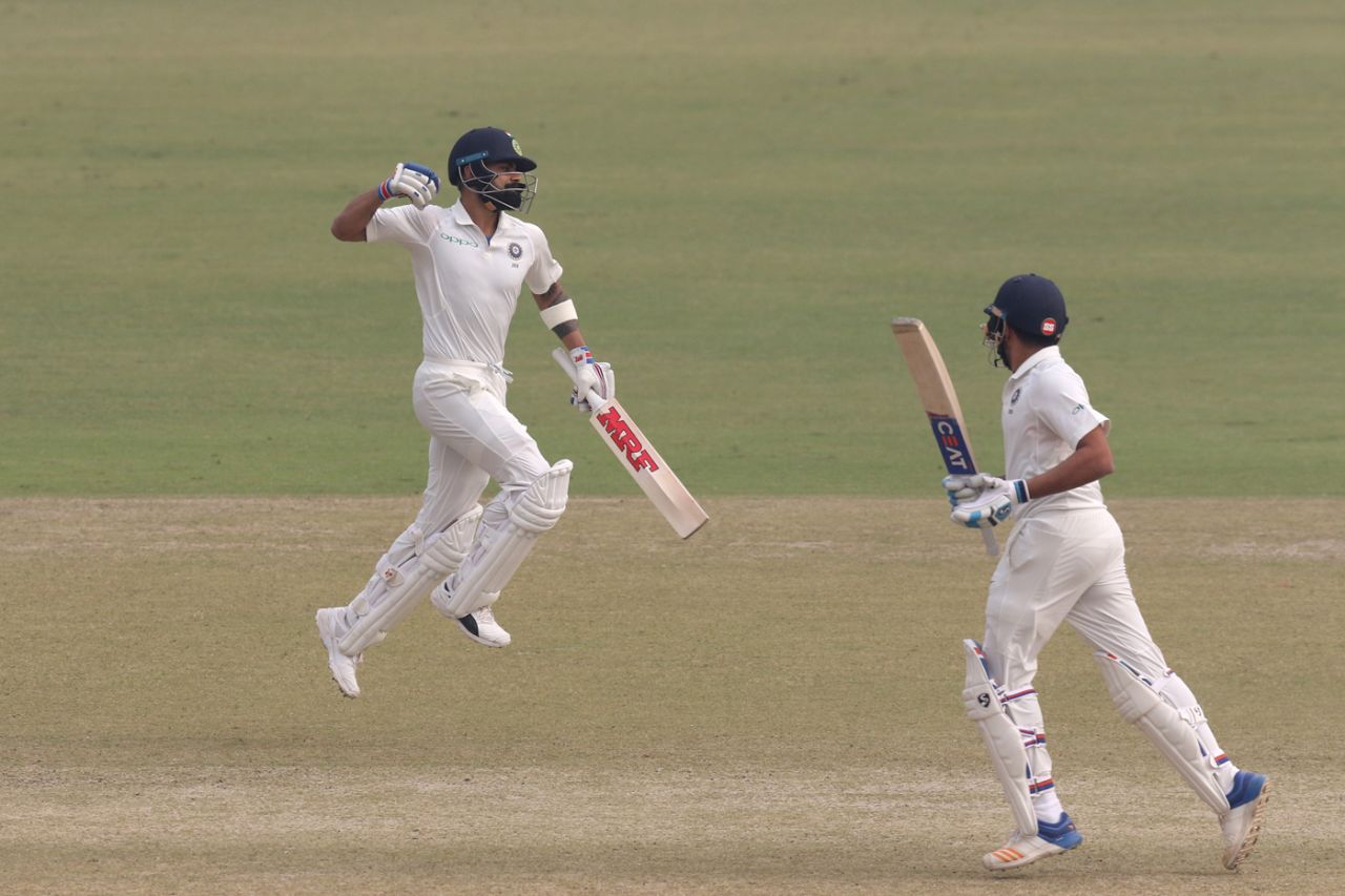 Virat Kohli punches in the air after getting to his double-hundred, India v Sri Lanka, 3rd Test, Delhi, 2nd day, December 3, 2017