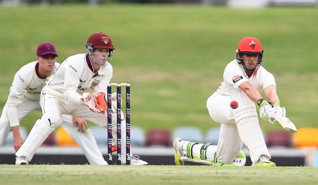 Jake Lehmann lunges to sweep, Queensland v South Australia, Sheffield Shield 2017-18, Cairns