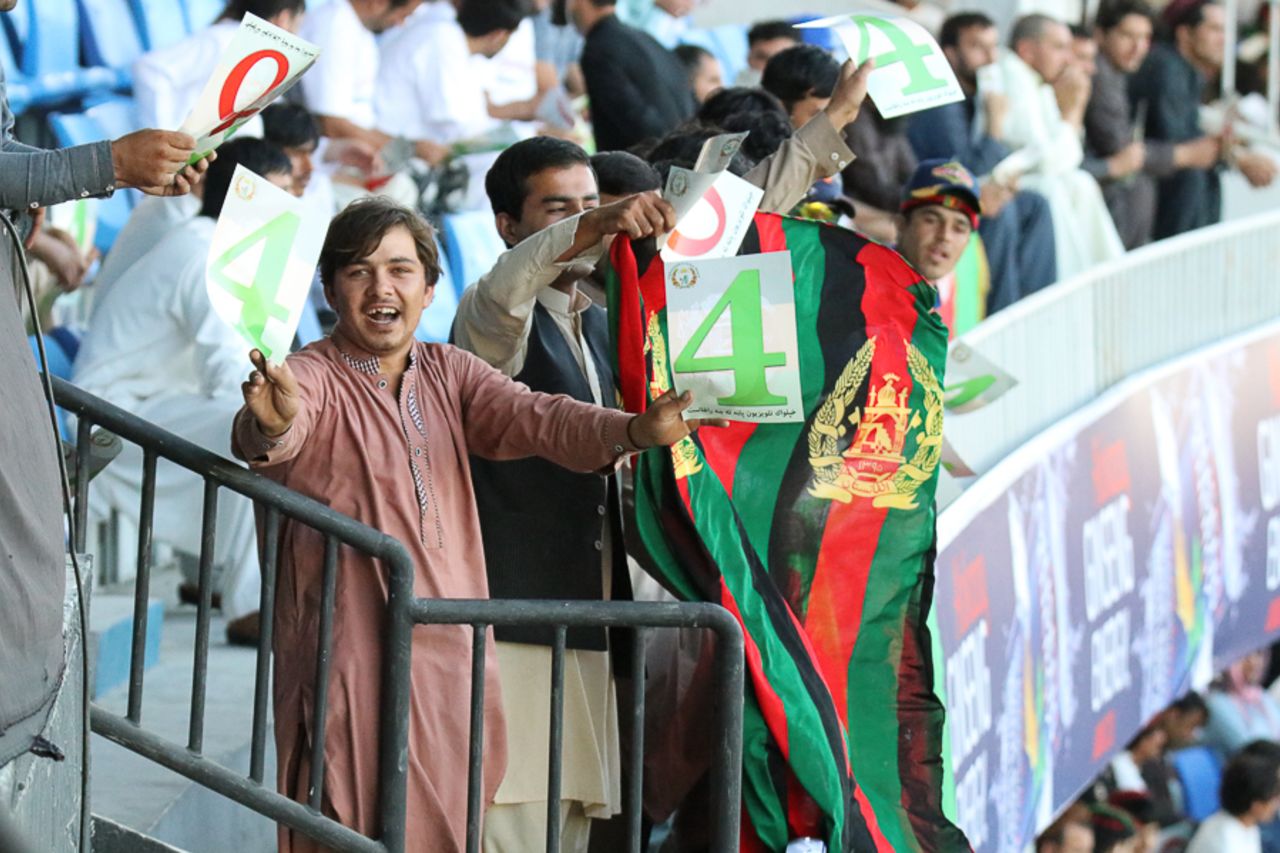 A young Afghanistan fan cheers for a boundary, Afghanistan v Ireland, 1st ODI, Sharjah, December 5, 2017