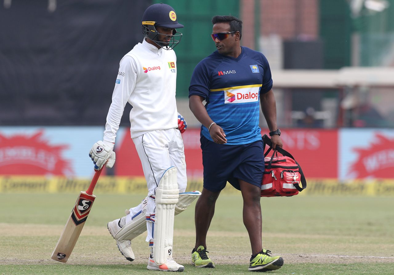 Dhananjaya de Silva walks off the field after retiring hurt on 119, India v Sri Lanka, 3rd Test, Delhi, 5th day, December 6, 2017